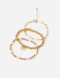 Gold-tone beaded bracelet pack with heart charm and linked chain details