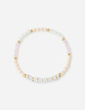 Letter bead bracelet with pale pink/white beads and gold “REVIVAL” beads