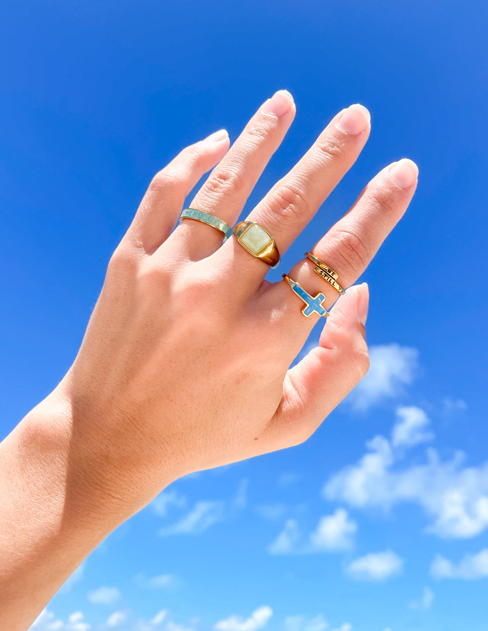 Gold tone ring with square yellow enamel centerpiece