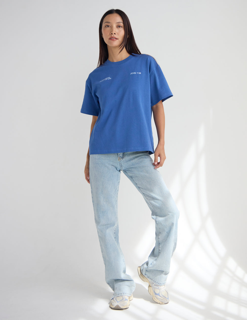 Blue crew-neck graphic T-shirt with tiny River of Life and John 7:38 prints