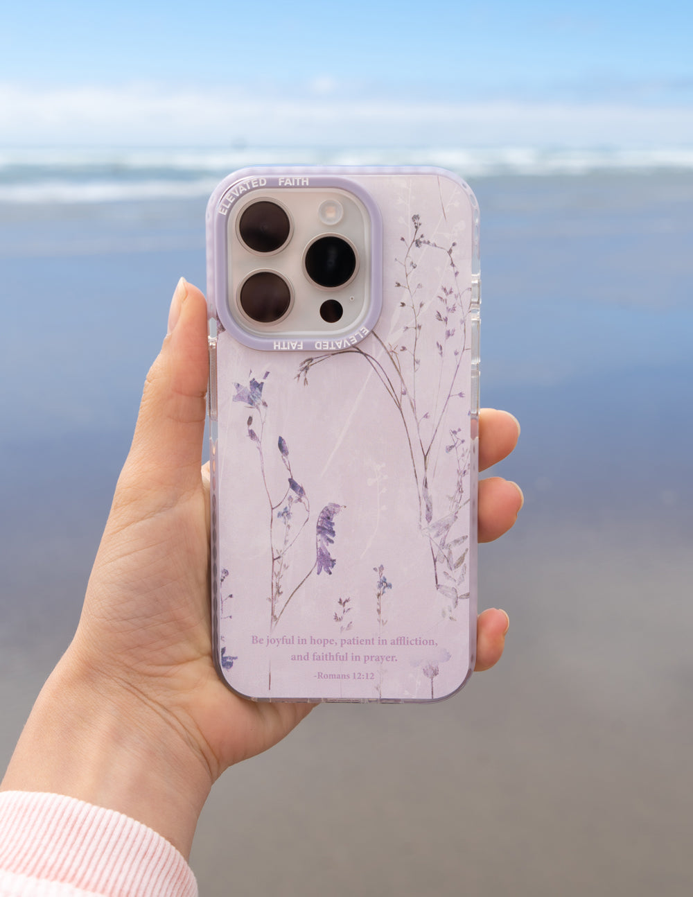 Lavender phone case with blue birds on floral branches and camera lens openings