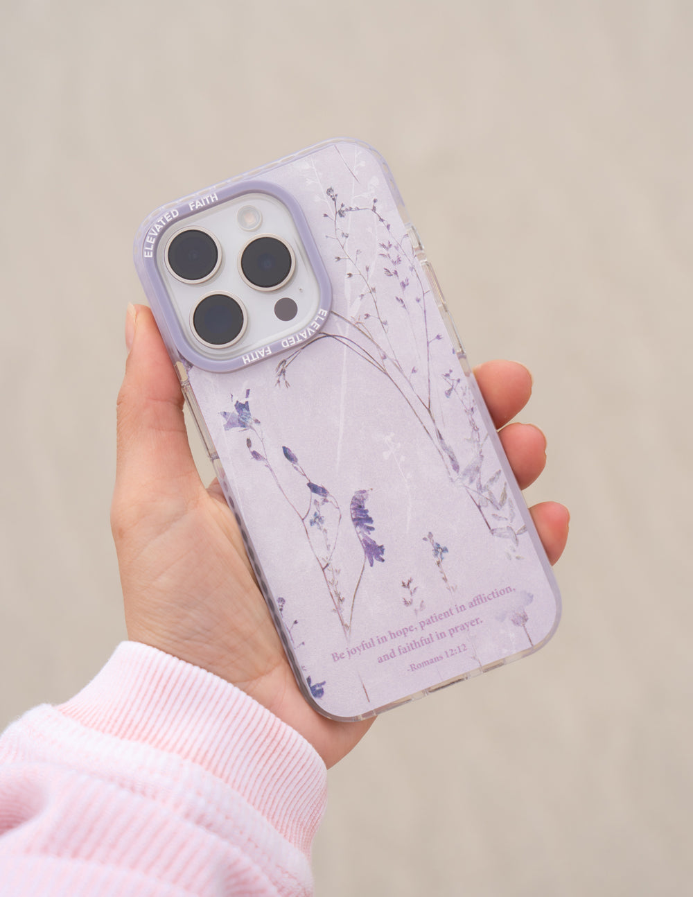 Lavender phone case with blue bird and floral branch print, camera cutouts and small text