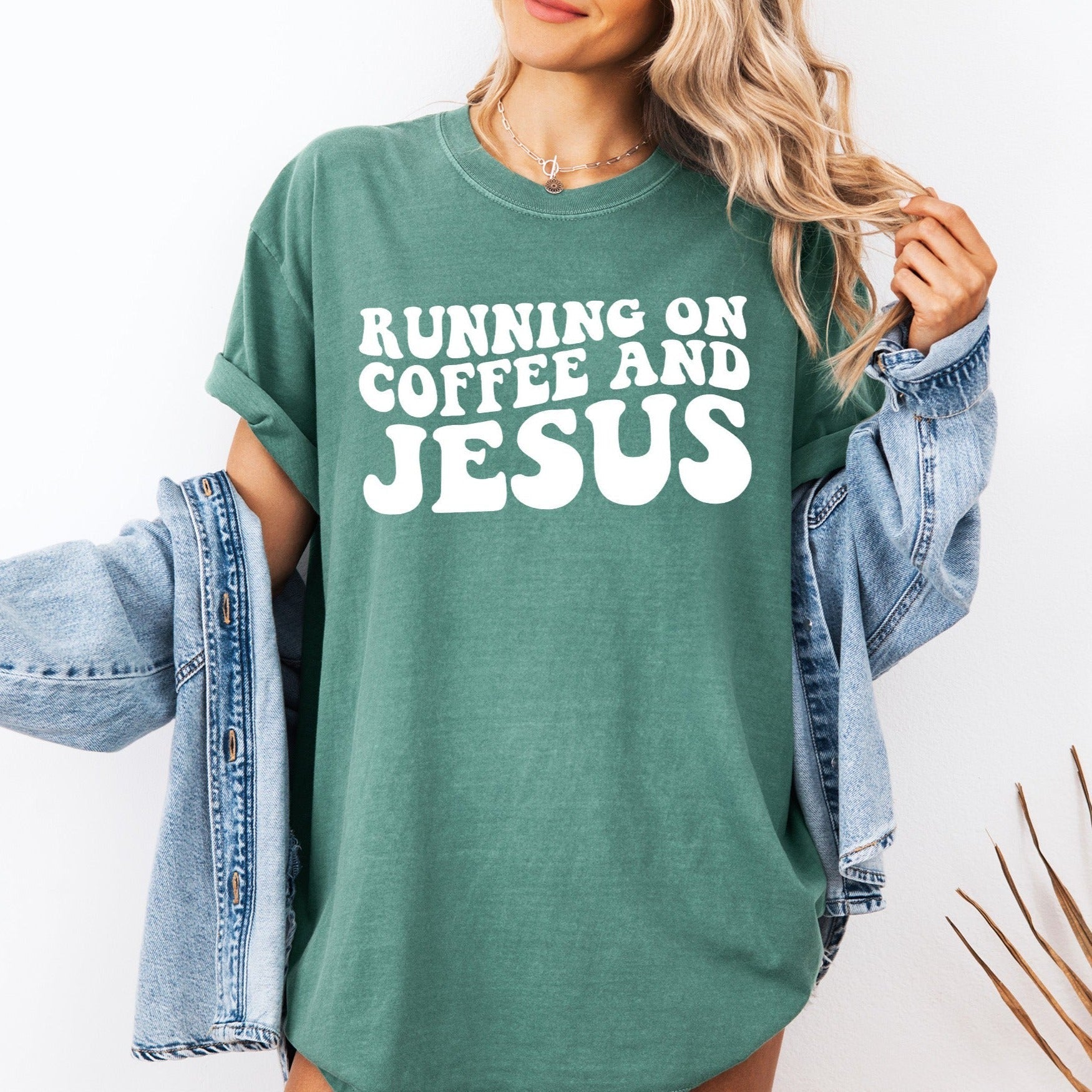 Fern green Christian graphic t-shirt with Running on Coffee and Jesus front print
