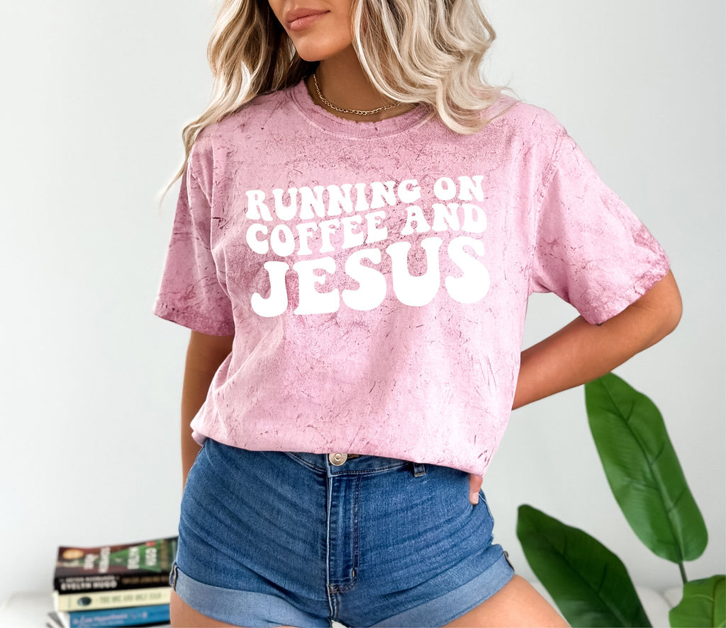 Pink heather graphic T-shirt with RUNNING ON COFFEE AND JESUS lettering