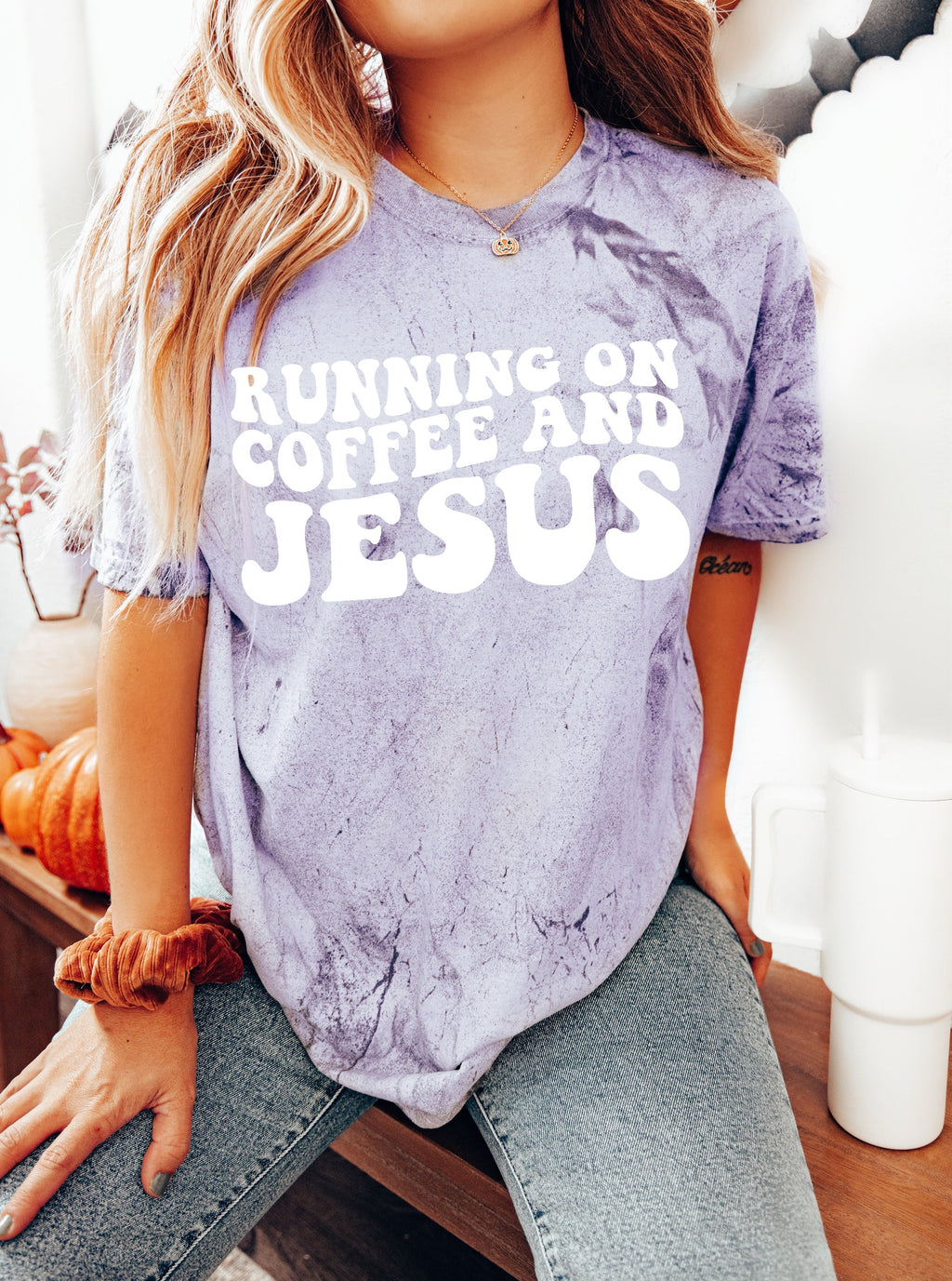 Purple heather graphic T-shirt with RUNNING ON COFFEE AND JESUS lettering