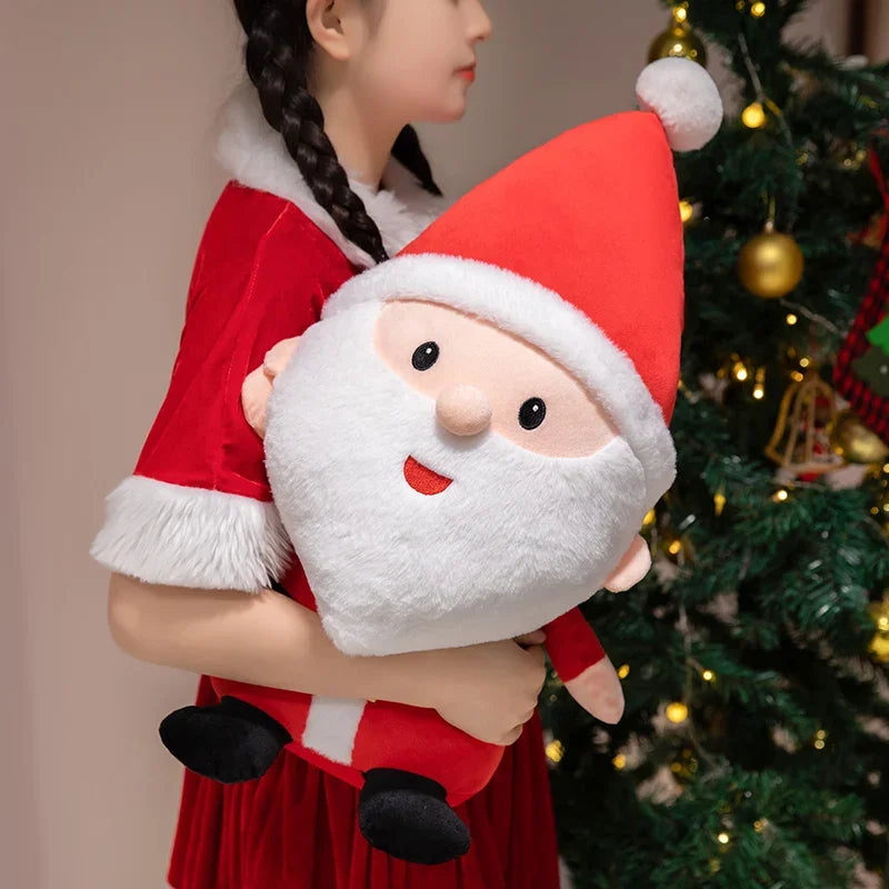 Santa Christmas plush toy with white beard and red hat, held in hands