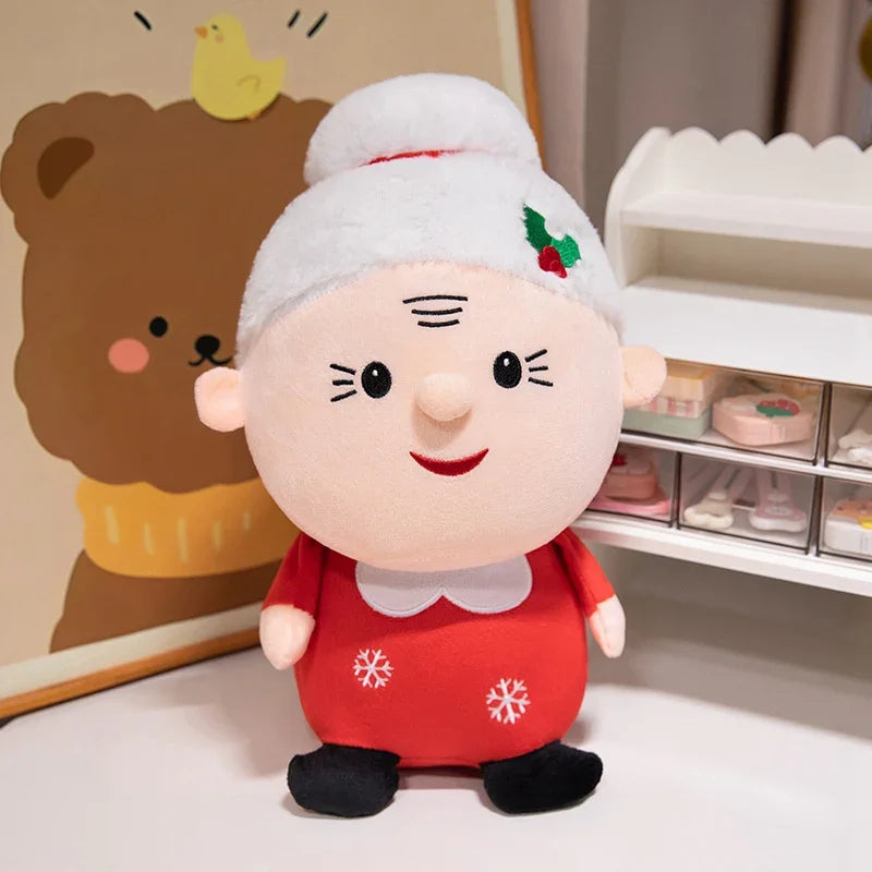 Snowman plush toy with red shirt and carrot nose, round white face
