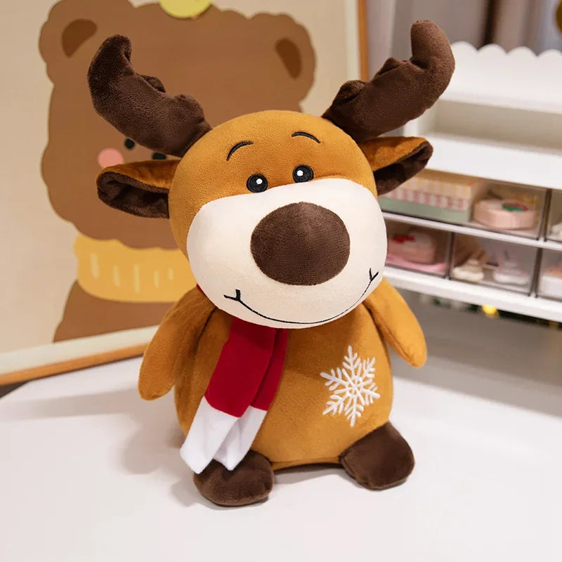 Reindeer plush toy with brown antlers, red scarf, and white snowflake patch