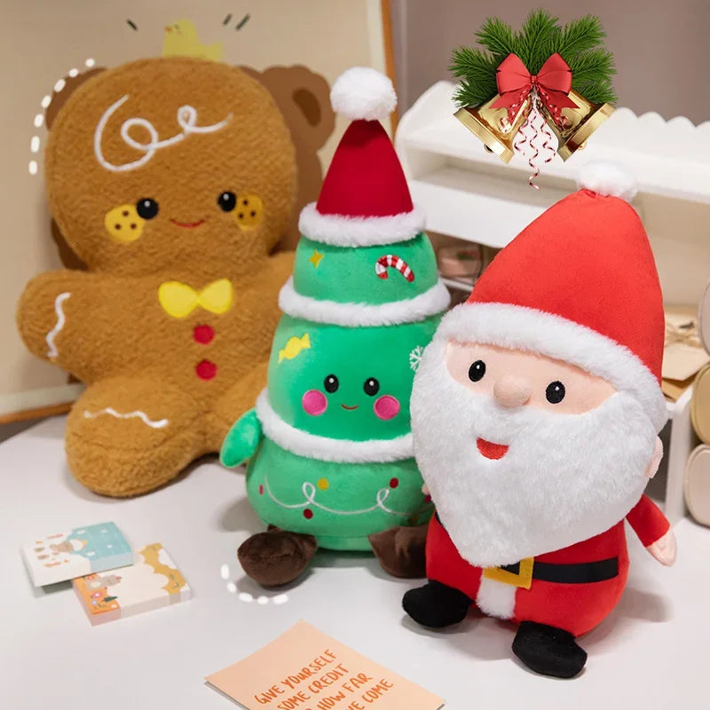 Christmas plush toys set: gingerbread, tree, and Santa beside small gift boxes