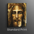 Framed portrait print of a bearded man with a glowing cross-like light on his forehead