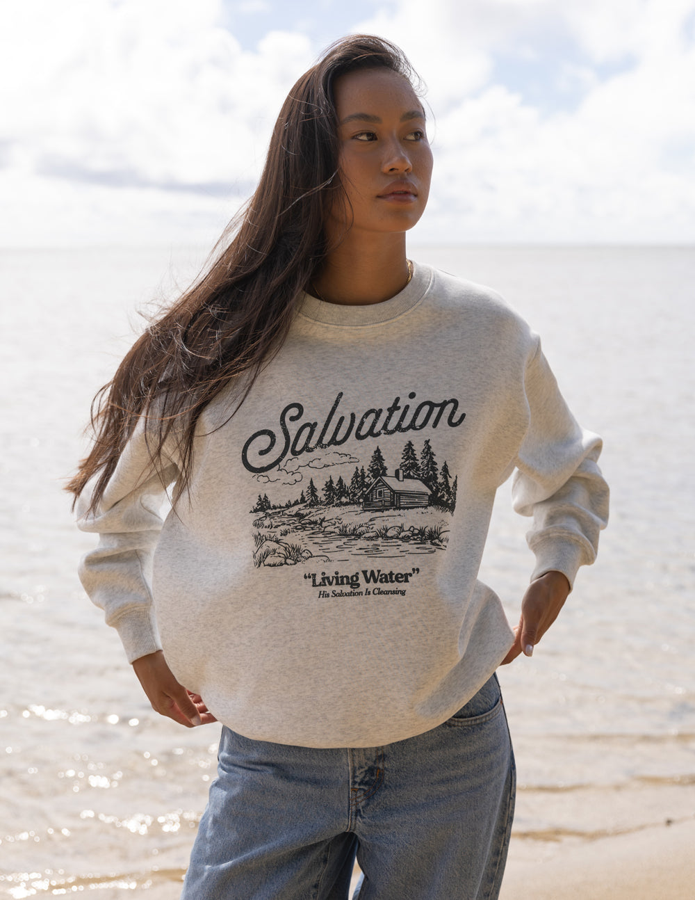 Heather gray unisex crewneck sweatshirt with Salvation landscape “Living Water” graphic