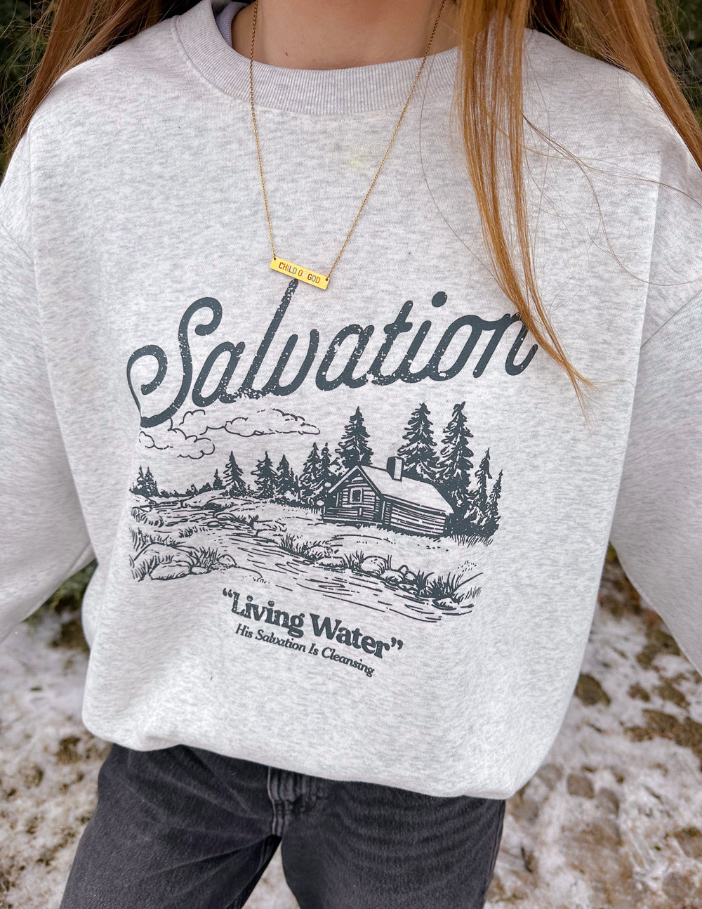 Heather gray crewneck sweatshirt with Salvation graphic and landscape print