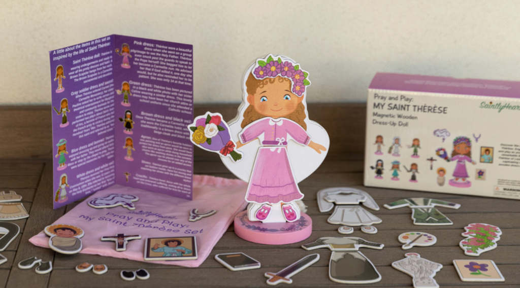 My Saint Thérèse magnetic wooden dress-up doll set with doll, pieces, booklet, and box