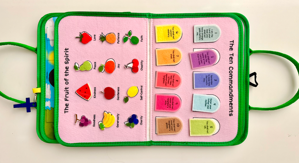 Two-page felt busy book layout with Fruit of the Spirit icons and small cards