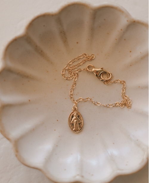 14K gold bracelet with adjustable clasp and oval miraculous medal pendant