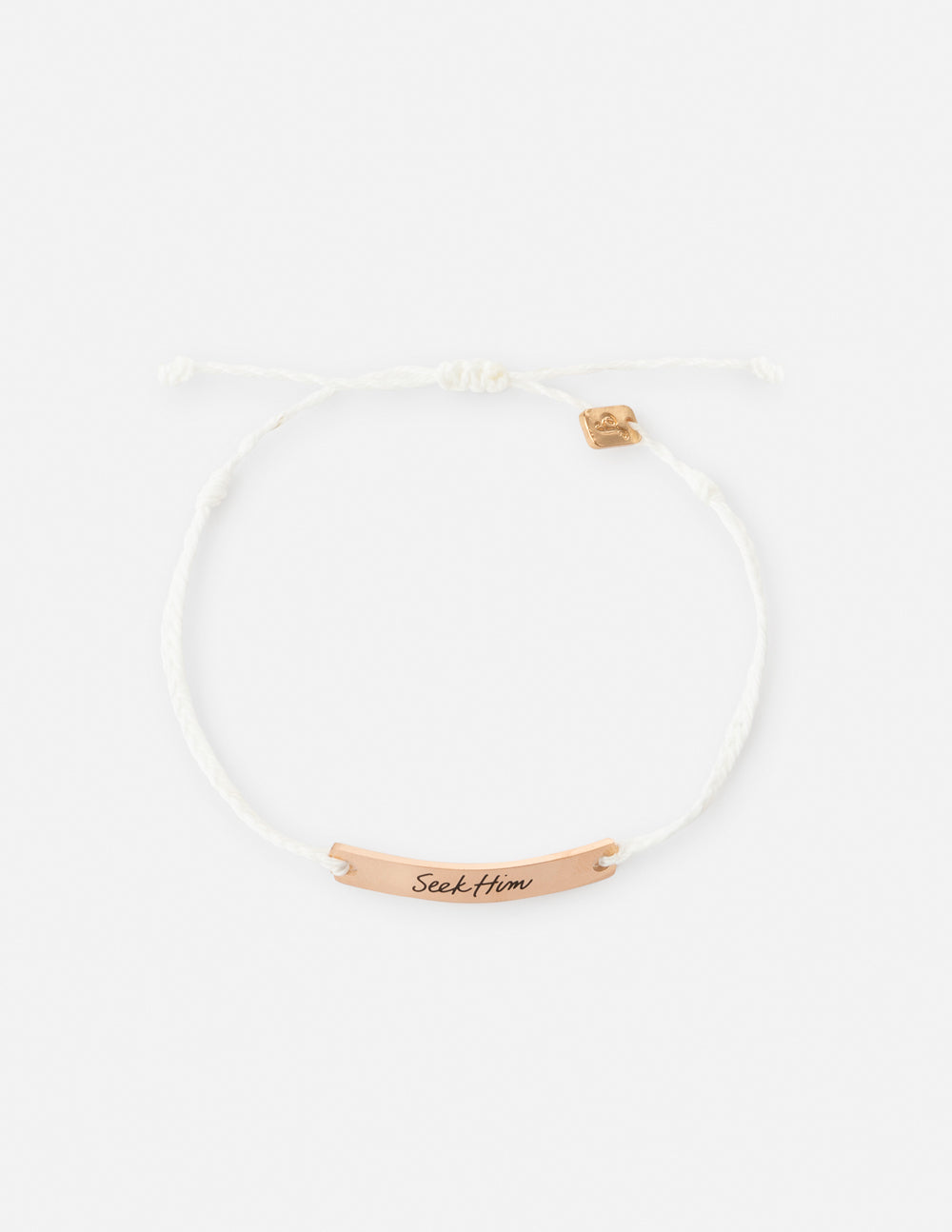White cord bracelet with gold beads and a "Seek Him" metal charm