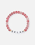 Selah letter bracelet with red and translucent bead strand and "SELAH" letter beads