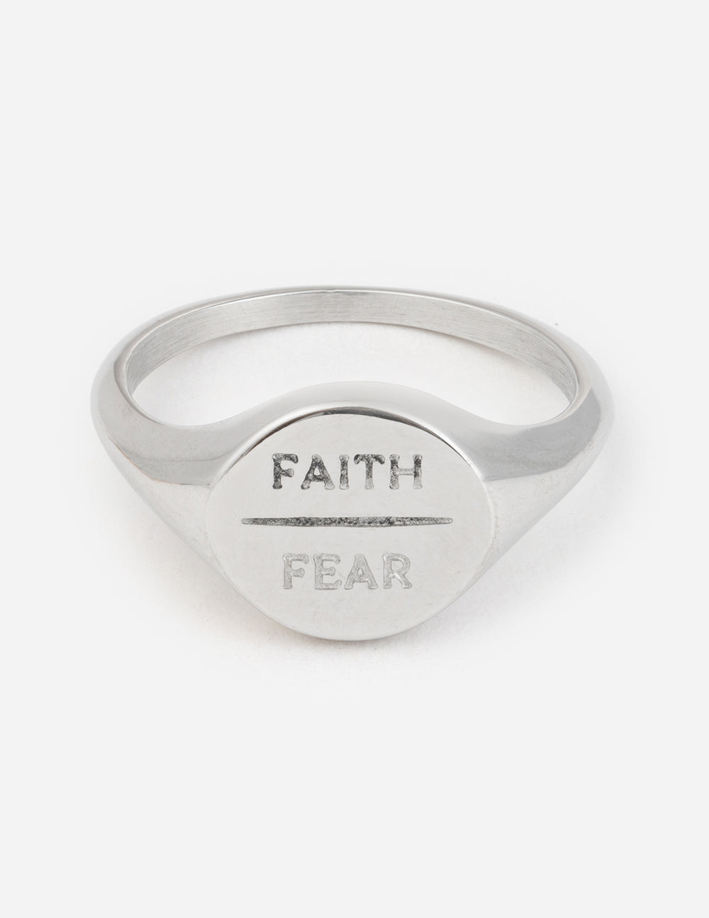 Silver faith over fear signet ring with 'FAITH' and 'FEAR' engraving on face