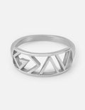 Silver statement ring with geometric cutout design on the band