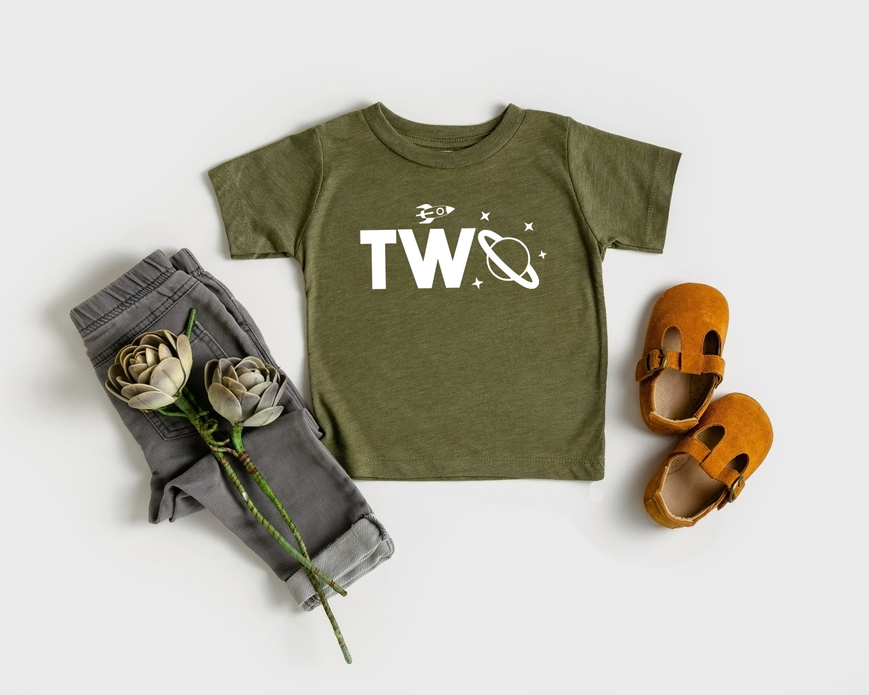 Kids space-themed T-shirt in olive green with “Two” graphic and star accents