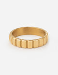 Gold spacer ring with ridged band, centered view