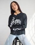 Black long-sleeve heavyweight tee with Spirit front graphic and crew neck.
