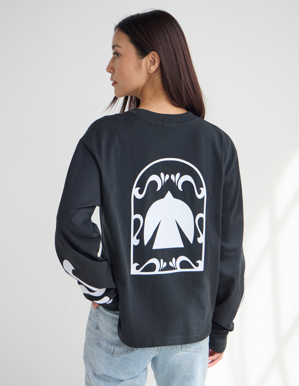 Black long-sleeve heavyweight tee with large back Spirit graphic, crew neck.