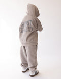 Kids taupe hoodie with hood and “SPIRIT OF GOD” back graphic, front kangaroo pocket