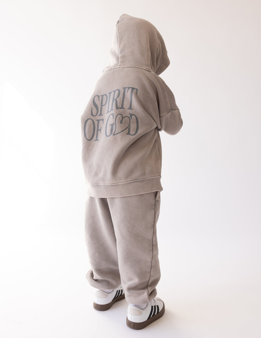 Kids taupe hoodie with hood and “SPIRIT OF GOD” back graphic, front kangaroo pocket