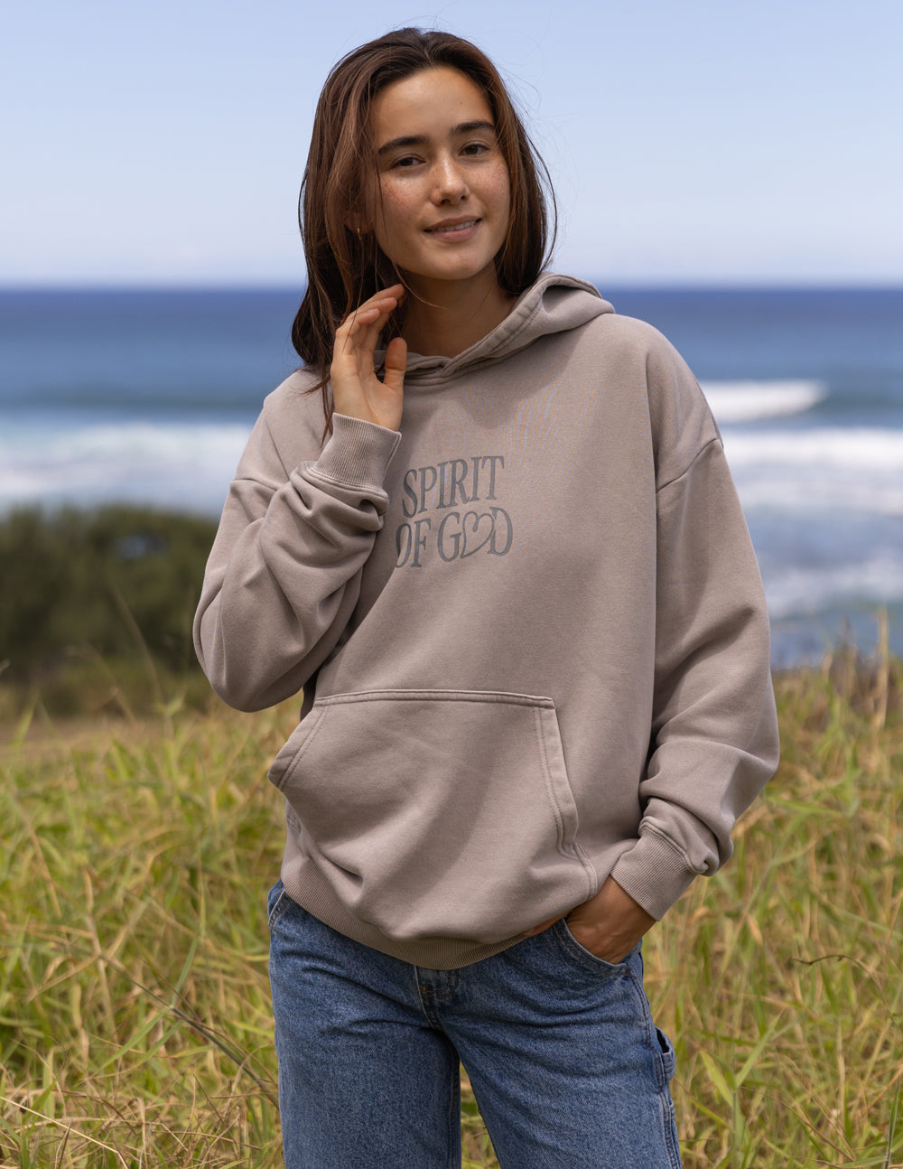 Taupe unisex hoodie with 'Spirit of God' chest print, pullover hood, front pocket