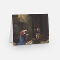 Nativity scene greeting card with Mary holding baby and figures in a stable