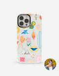 Phone case with colorful sticker collage graphic, light base, dual camera and flash cutouts