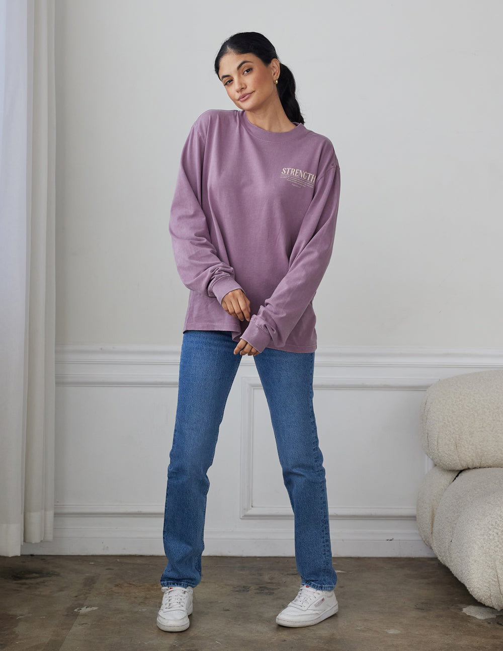 Lavender long-sleeve unisex T-shirt with small front chest graphic