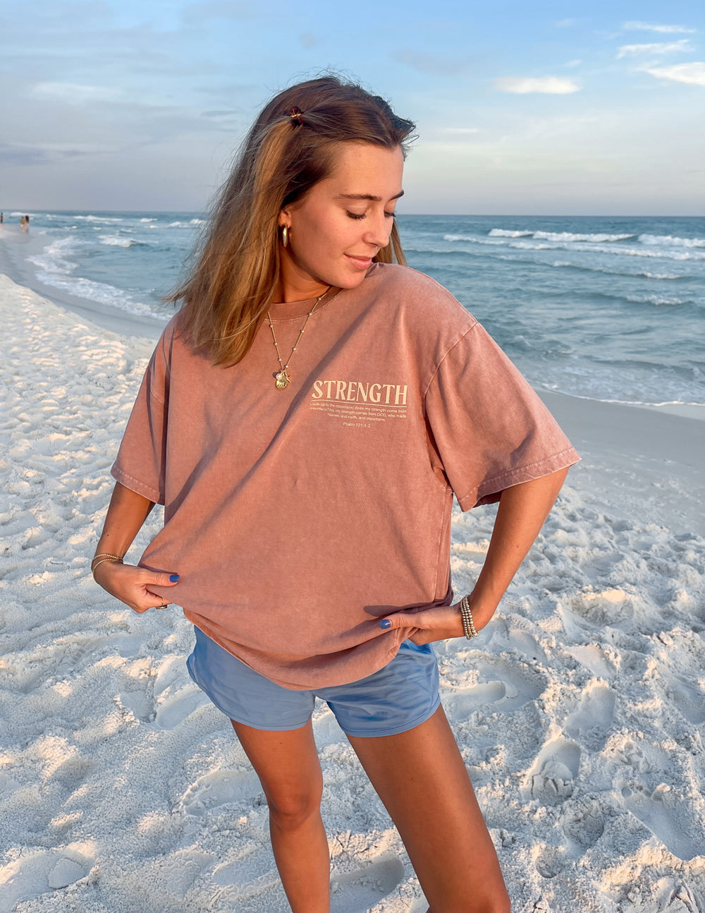 Unisex tee with 'STRENGTH' front print, dusty rose