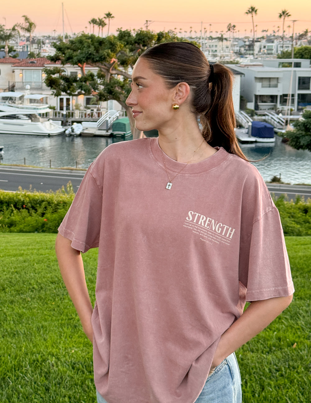 Unisex tee with 'STRENGTH' chest print, dusty rose