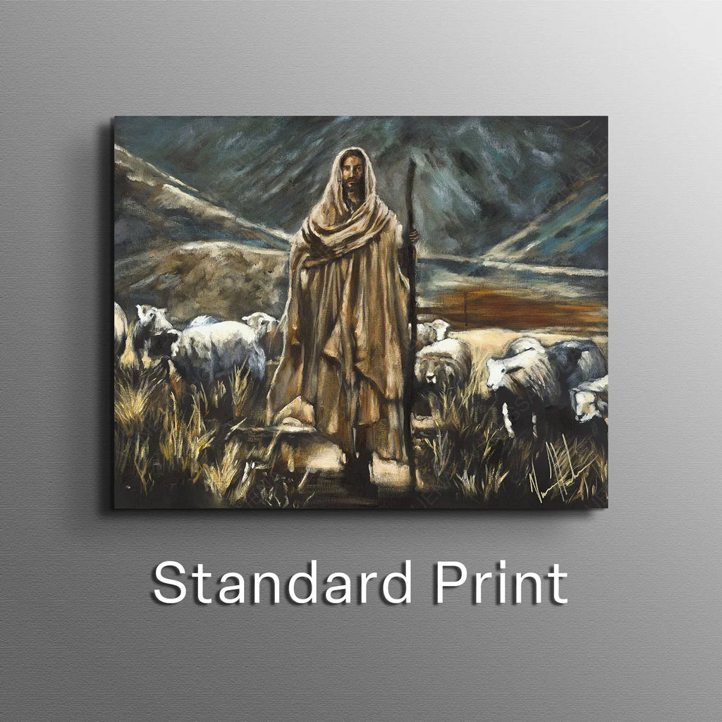 Framed wall art print of robed shepherd standing among sheep in a field