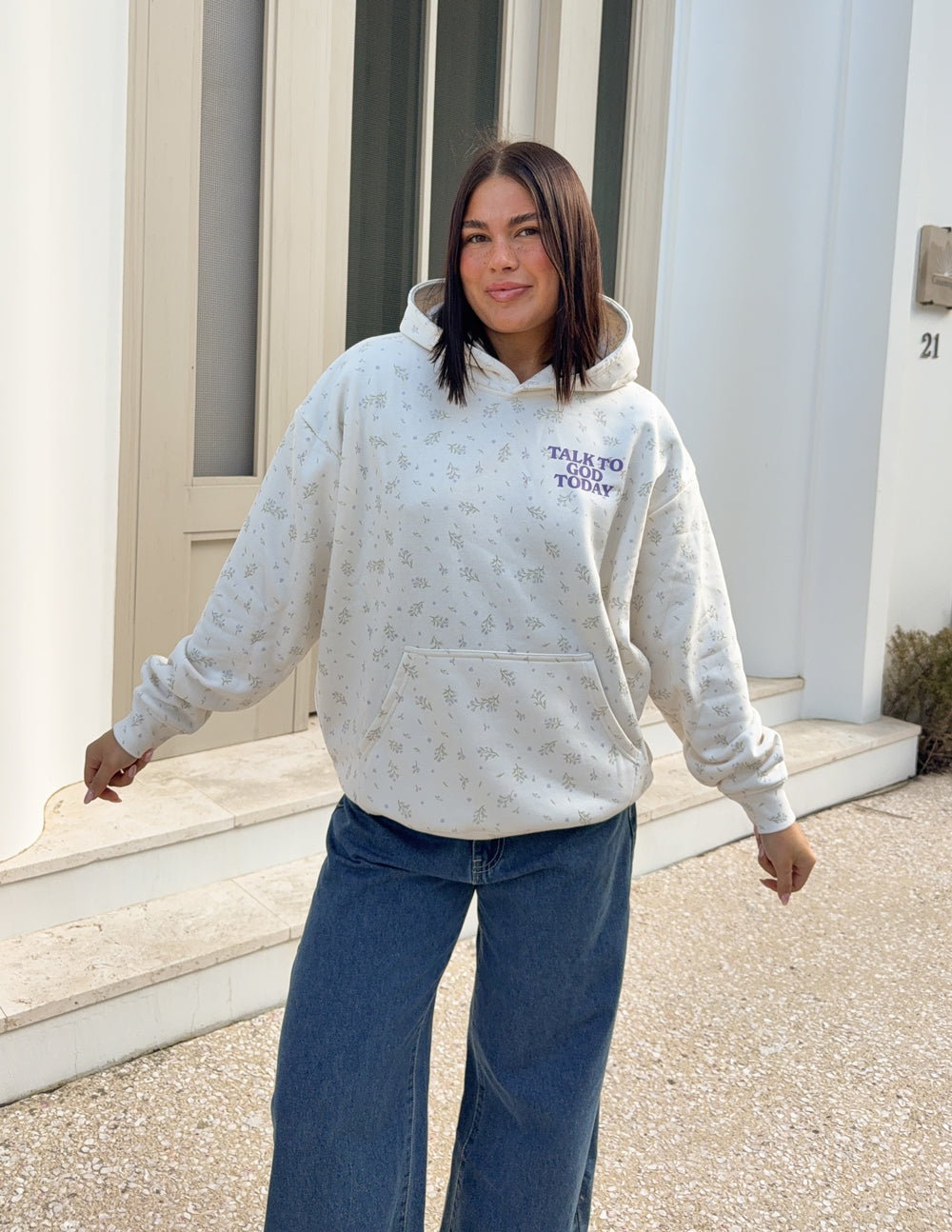Unisex cream wildflower-print hoodie with front “Talk to God Today” lettering and hood
