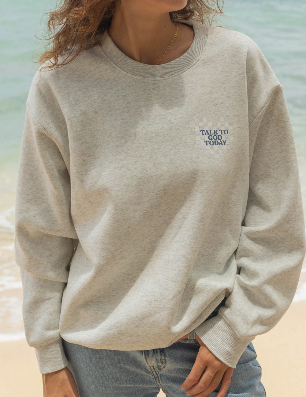 Light heather gray crewneck sweatshirt with small “Talk to God Today” chest logo.