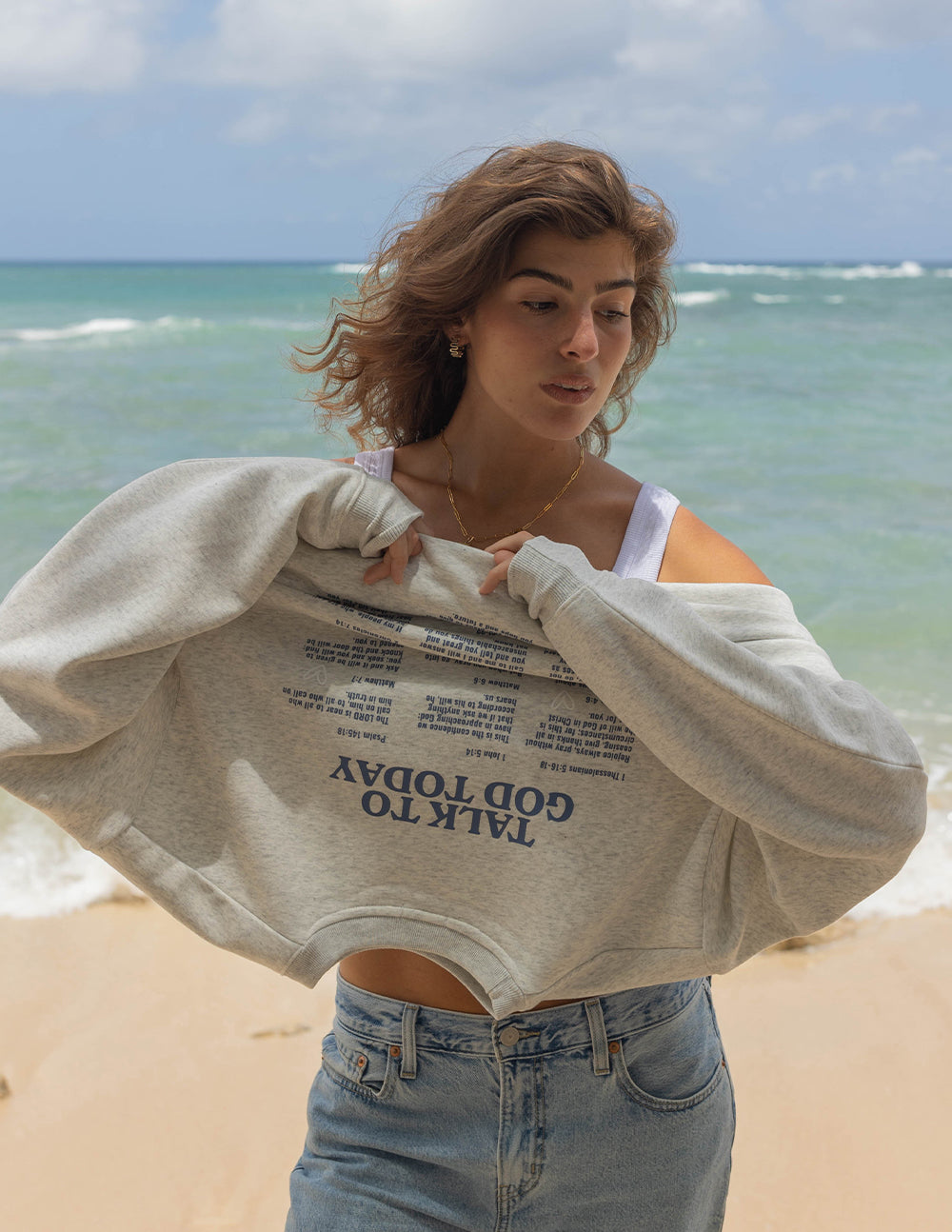 Light heather gray unisex crewneck sweatshirt with small “Talk to God Today” chest graphic.