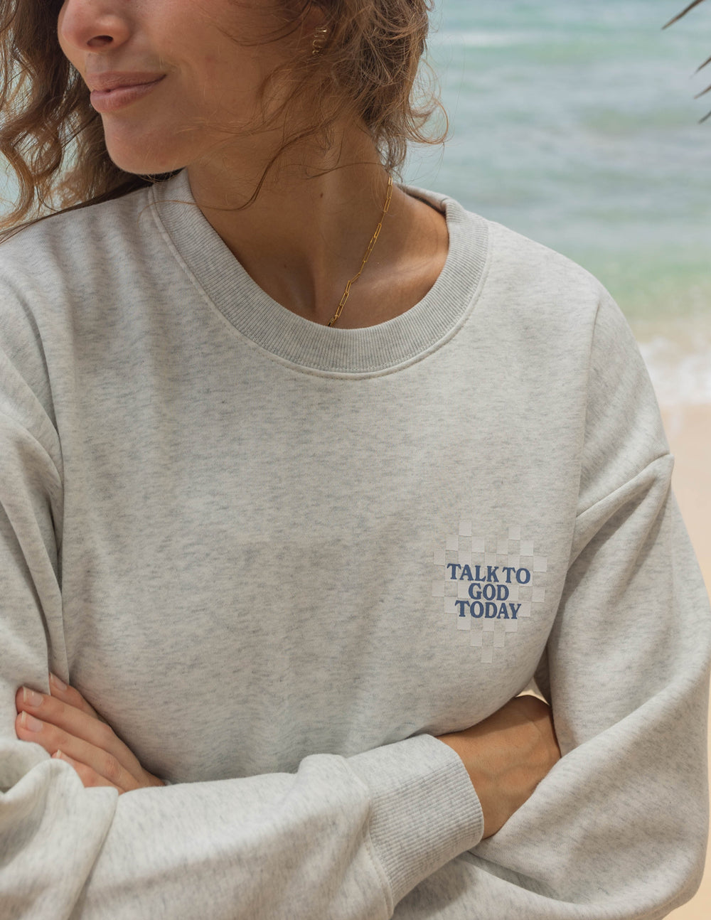 Light heather gray crewneck sweatshirt with small “Talk to God Today” chest logo.
