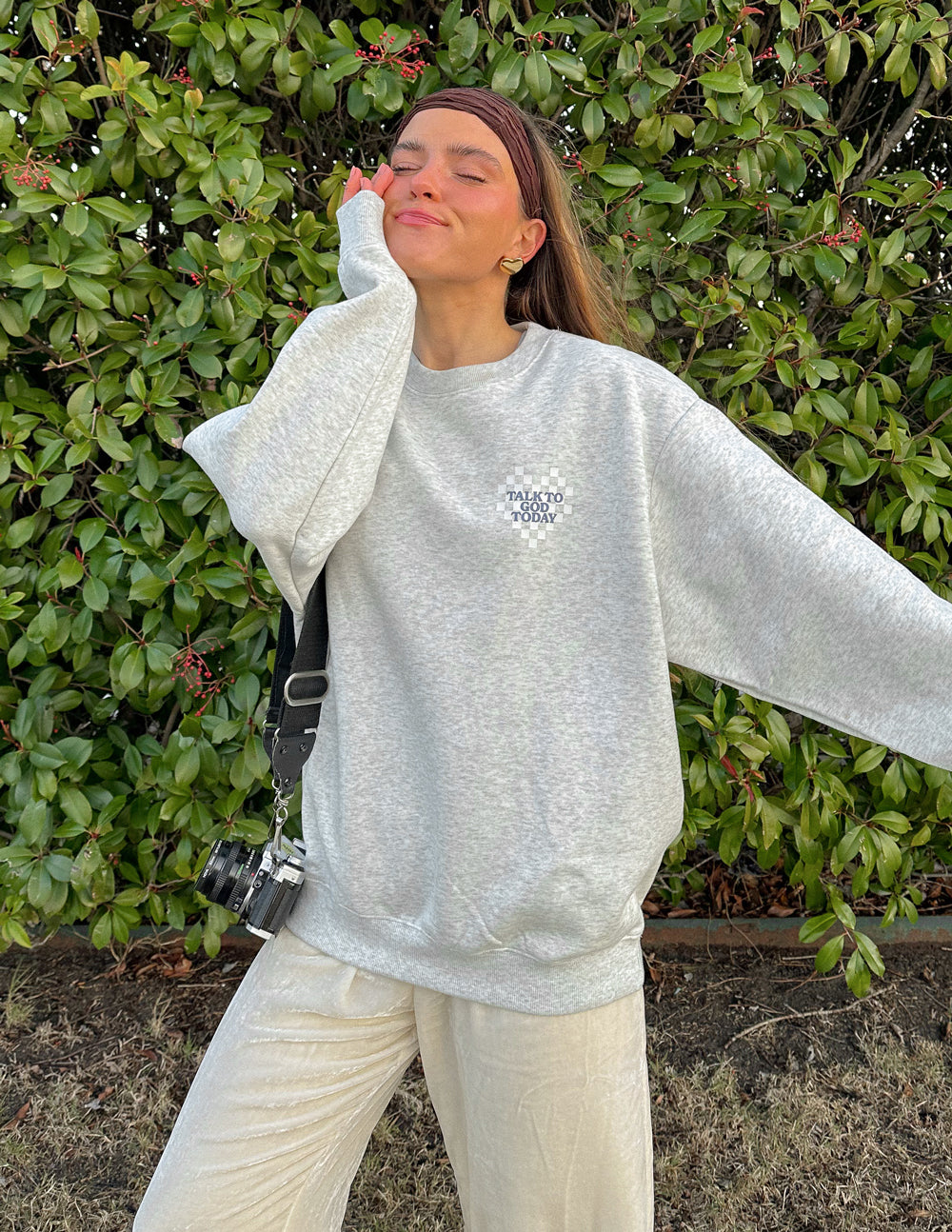 Light heather gray unisex crewneck sweatshirt with small chest “Talk to God Today” graphic.