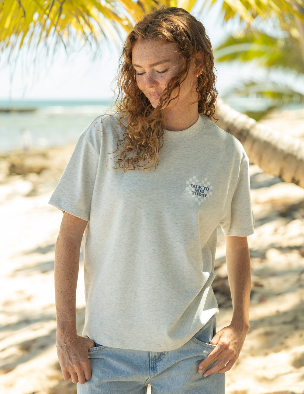Light heather gray unisex T-shirt with small chest logo and short sleeves