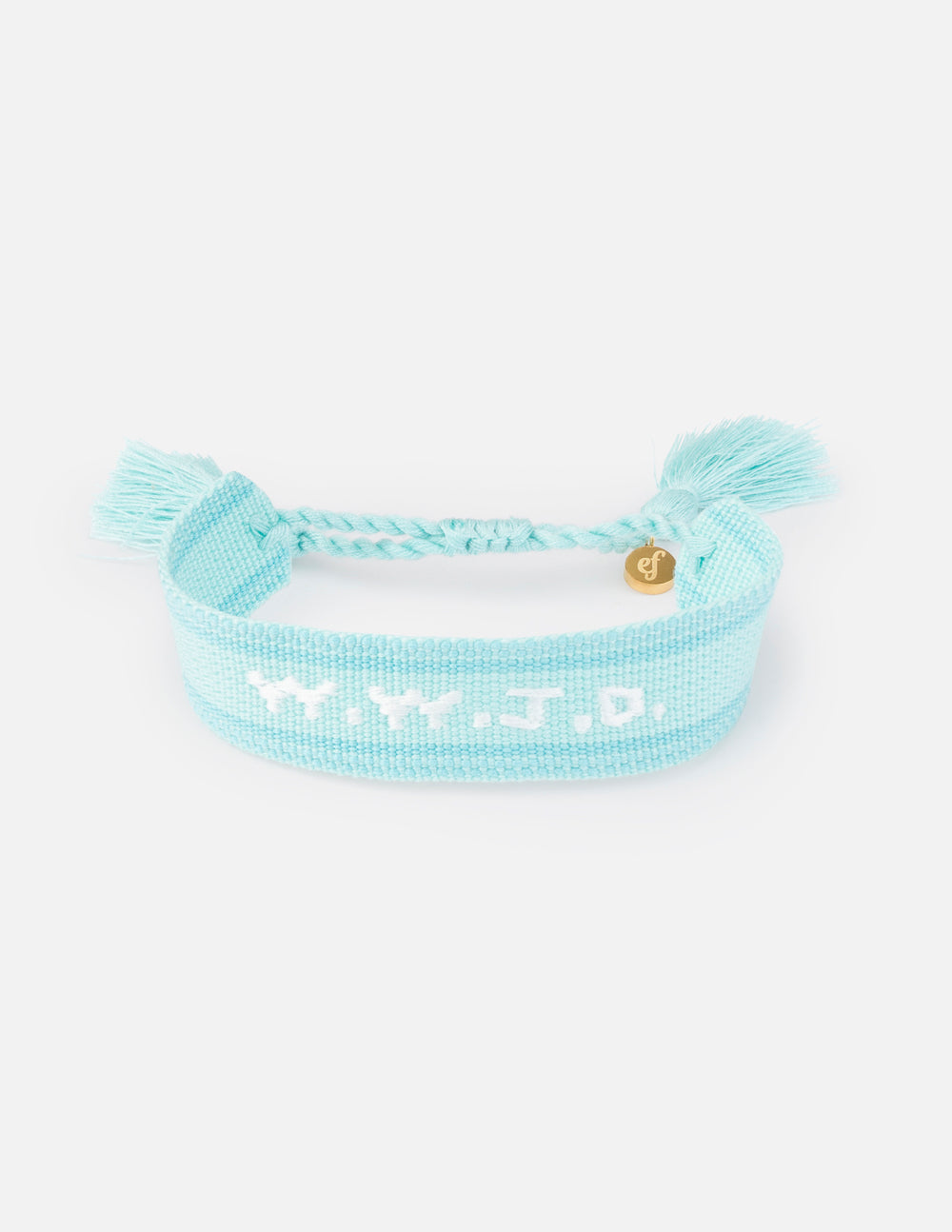 Light teal embroidered bracelet with braided tie, tassels, and small circular charm