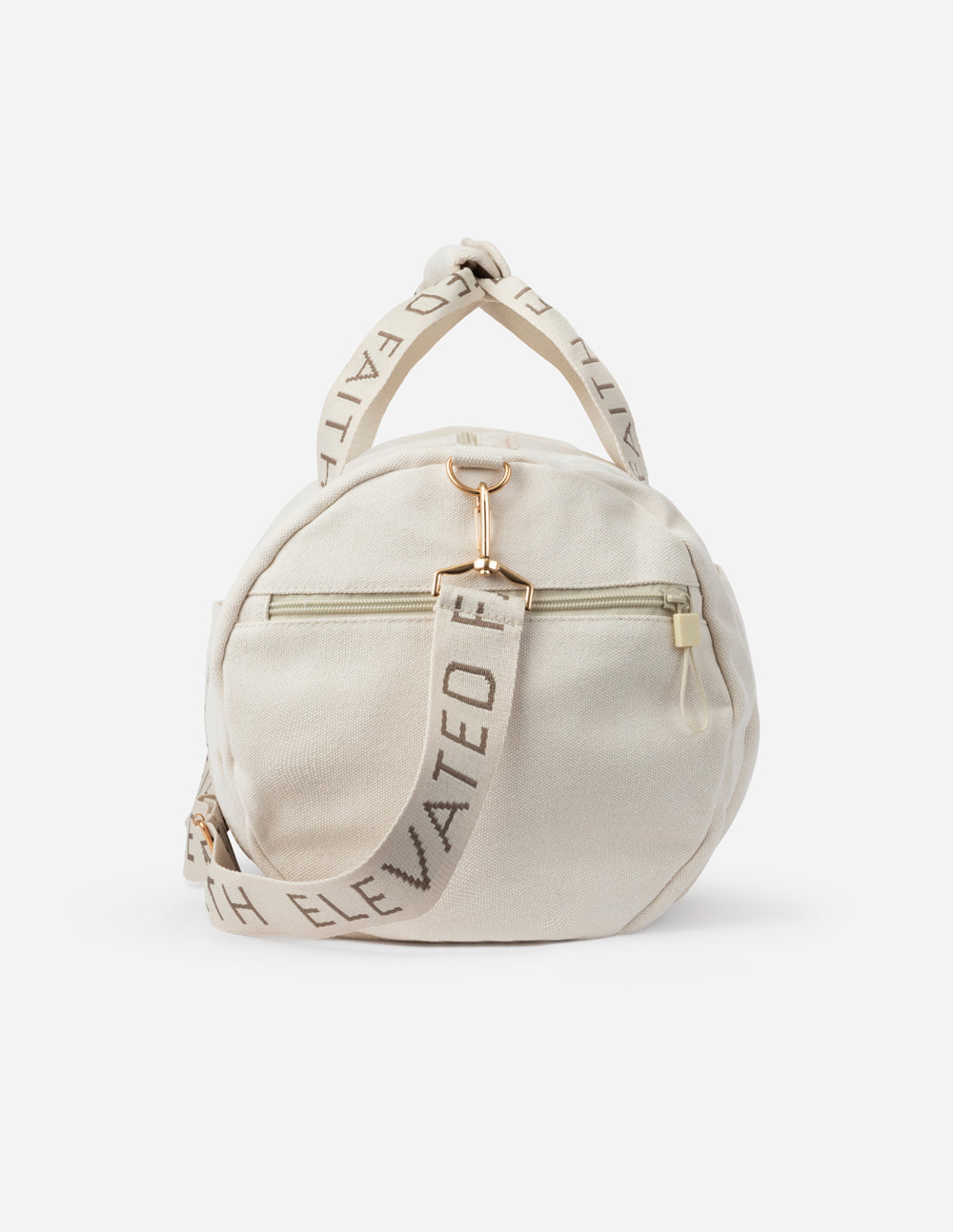 Cream canvas duffel bag with top handle and Elevate Faith strap text.