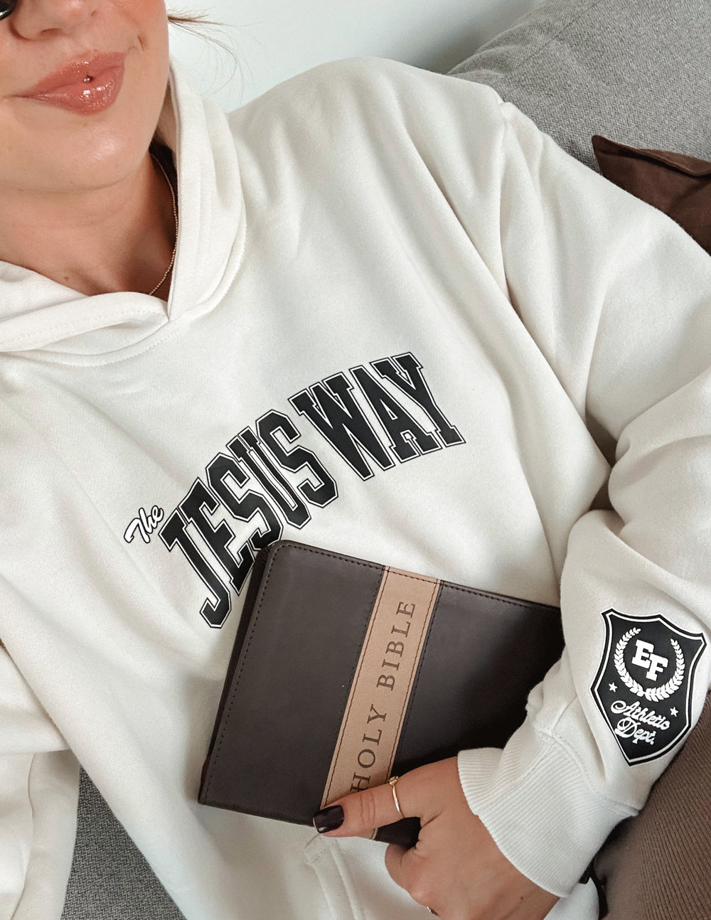 Unisex white hoodie with “JESUS WAY” chest print and sleeve crest patch