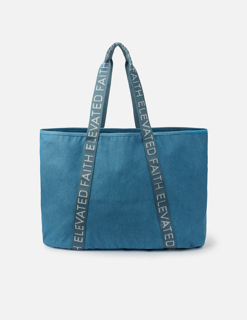 Blue denim tote bag with long handles featuring repeated logo text
