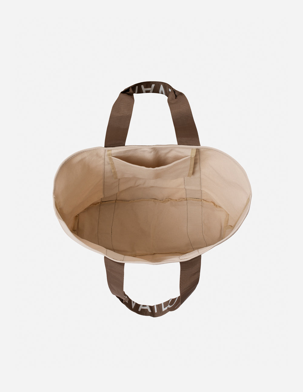 Cream fabric tote bag with brown handles, round open top, 'ELEVATED FAITH' lettering