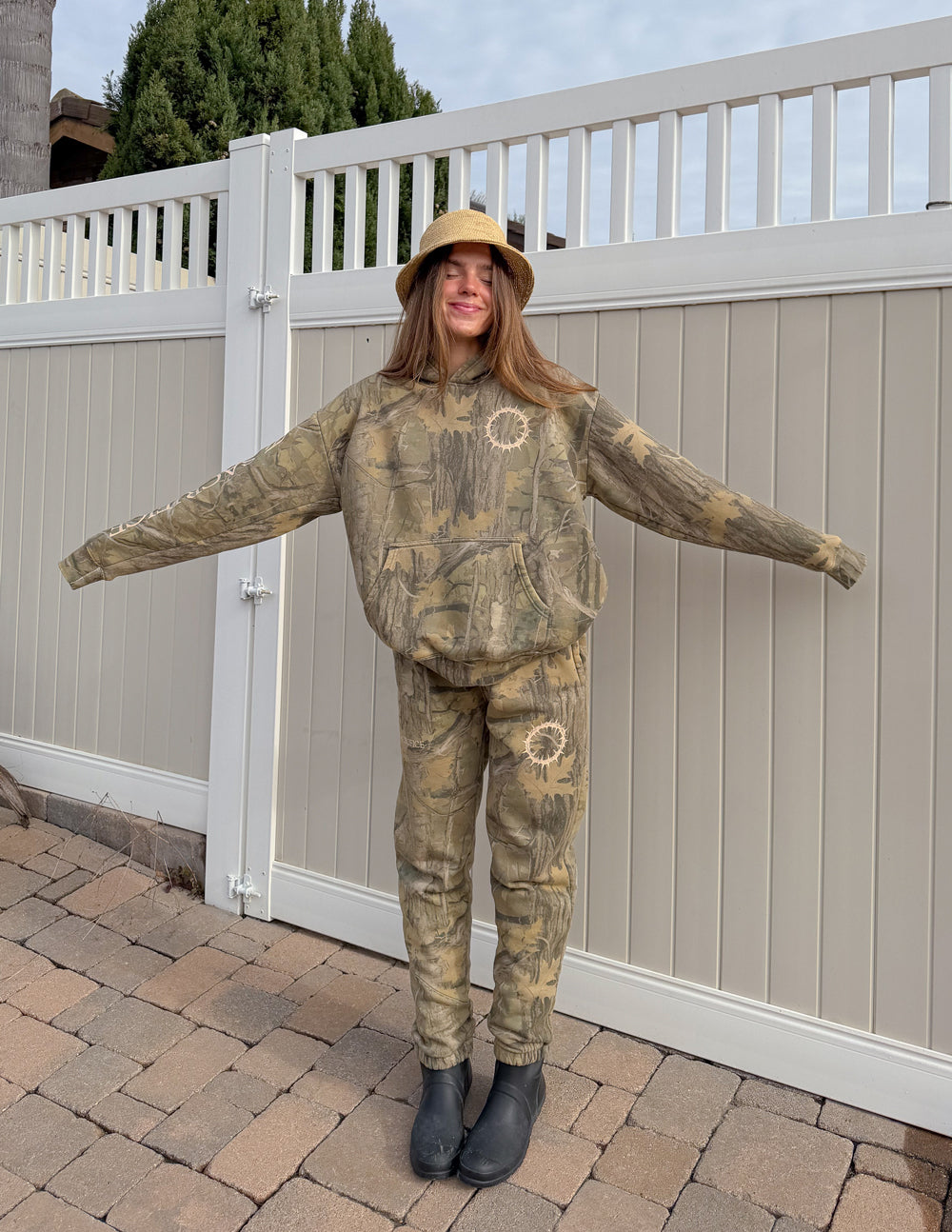 Camo unisex sweatpants with allover camouflage and elastic ankle cuffs