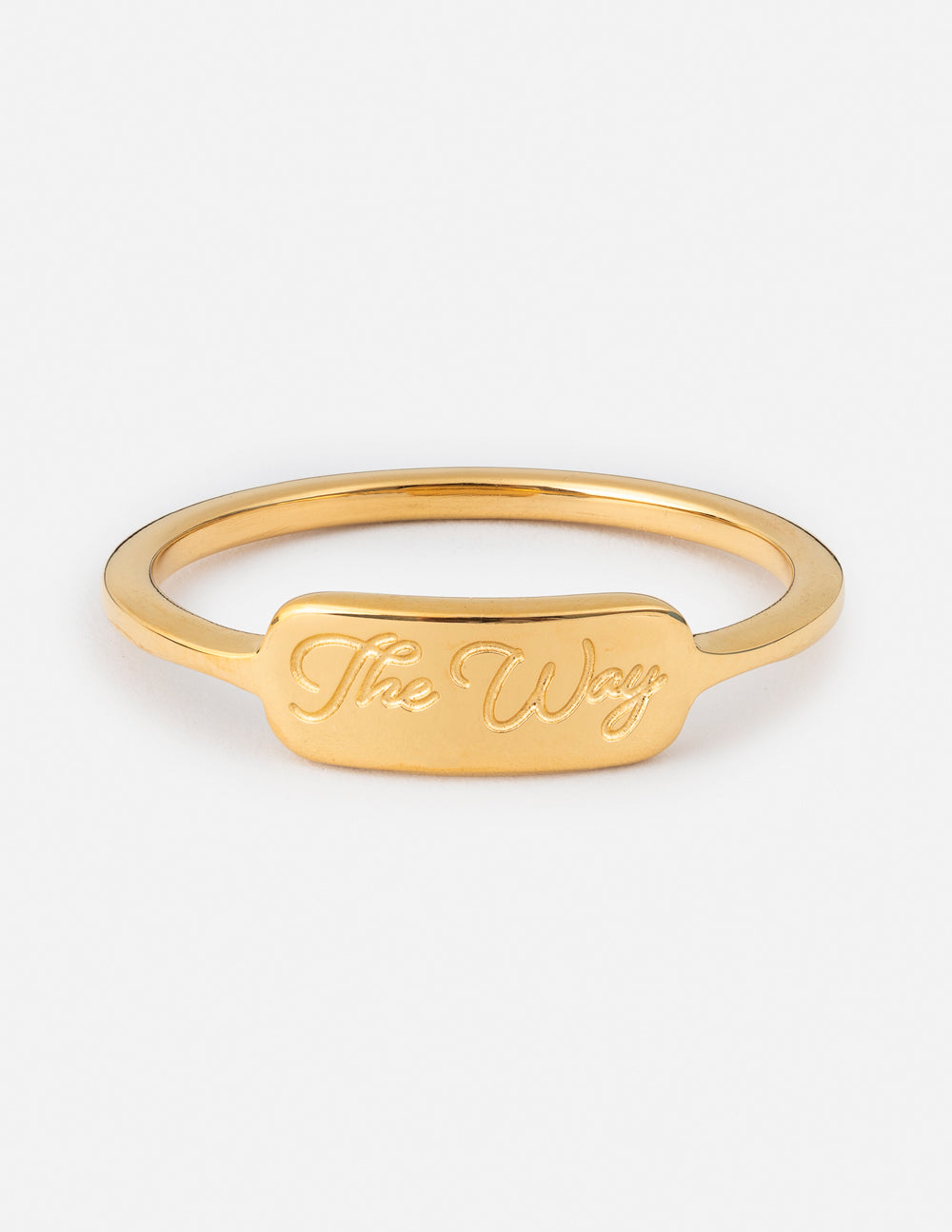Gold tone signet ring with engraved script front, slim band