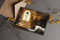 Easter greeting card with empty tomb illustration and 'The Lord is Risen' text.